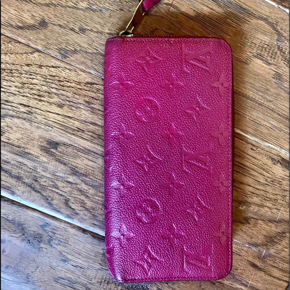 Louis Vuitton zippy wallet.
